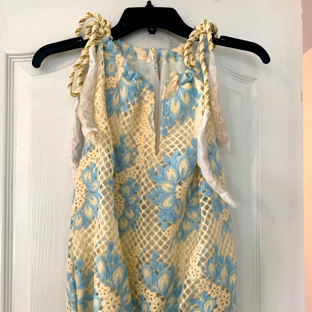 New sleeveless crochet shirt with tie shoulders